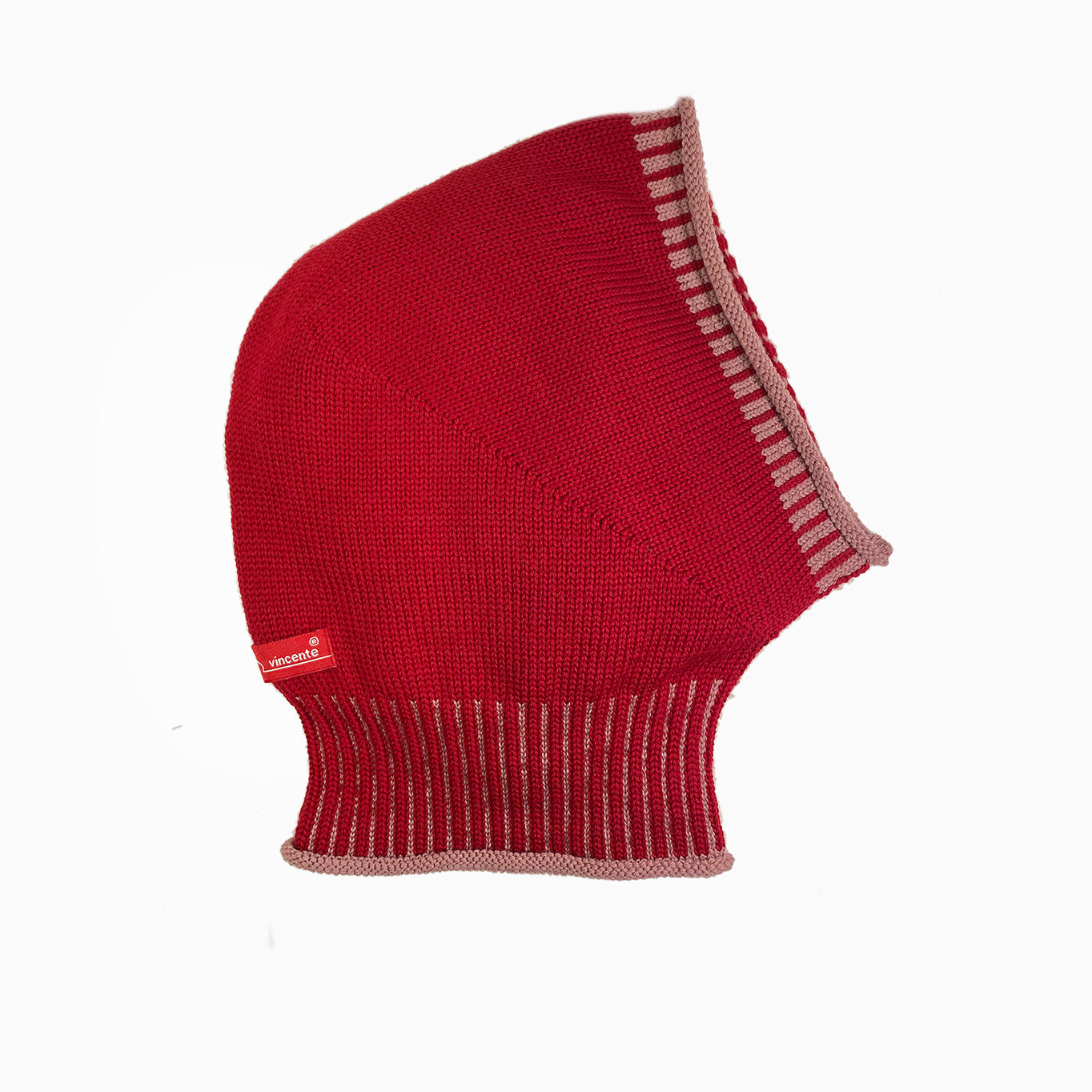 Rote, gestrickte Mütze wie eine Sturmhaube. Am Hals und um das Gesicht mit elastischem längsgestreiften Bund in Rosa.