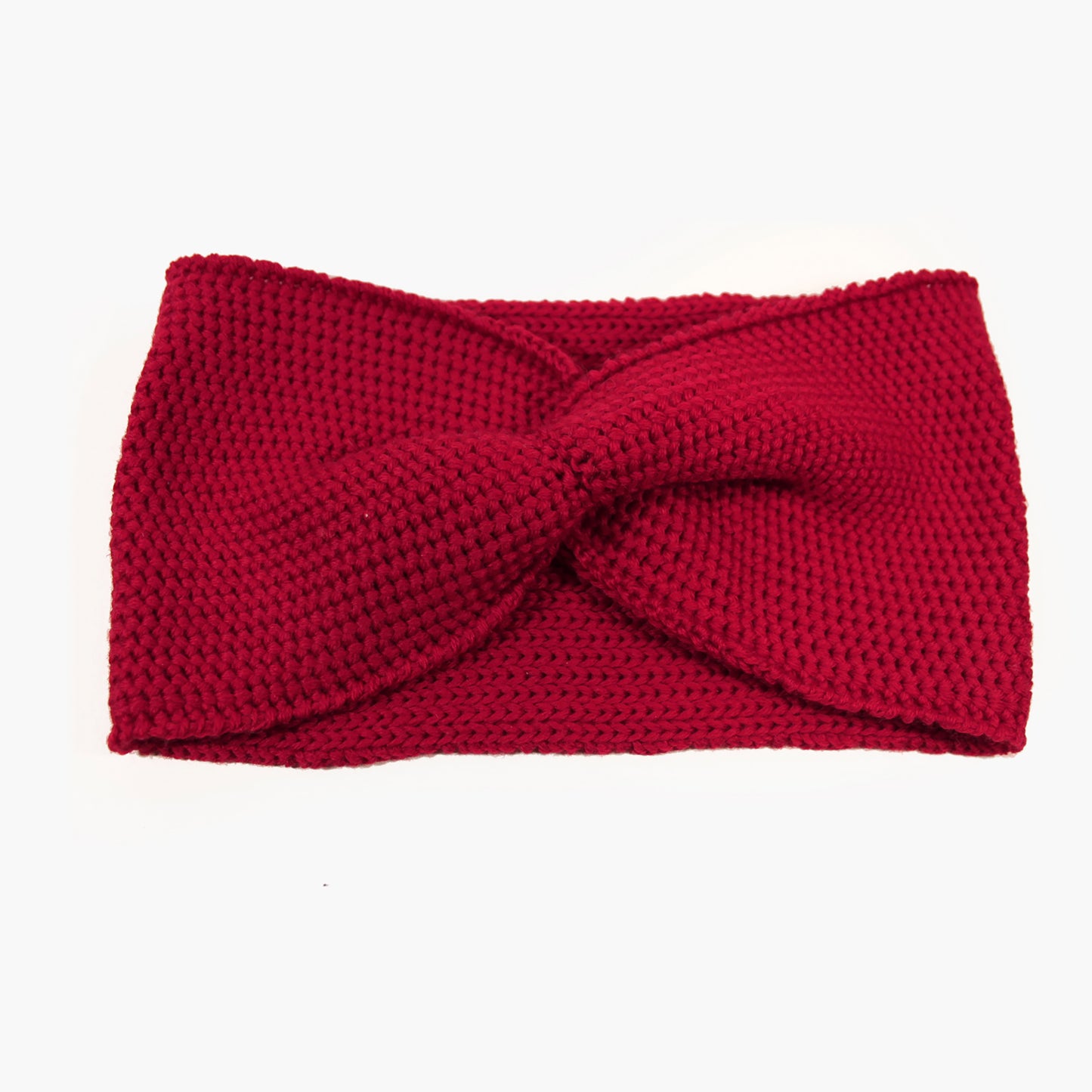 Rotes Stirnband mit einer Turban-ähnlichen Verdrehung. Gestrickt im Doubleface Patentmuster, außen Knötchenstruktur und Innen sieht es wie ein klassisch rechts gestricktes Muster aus.