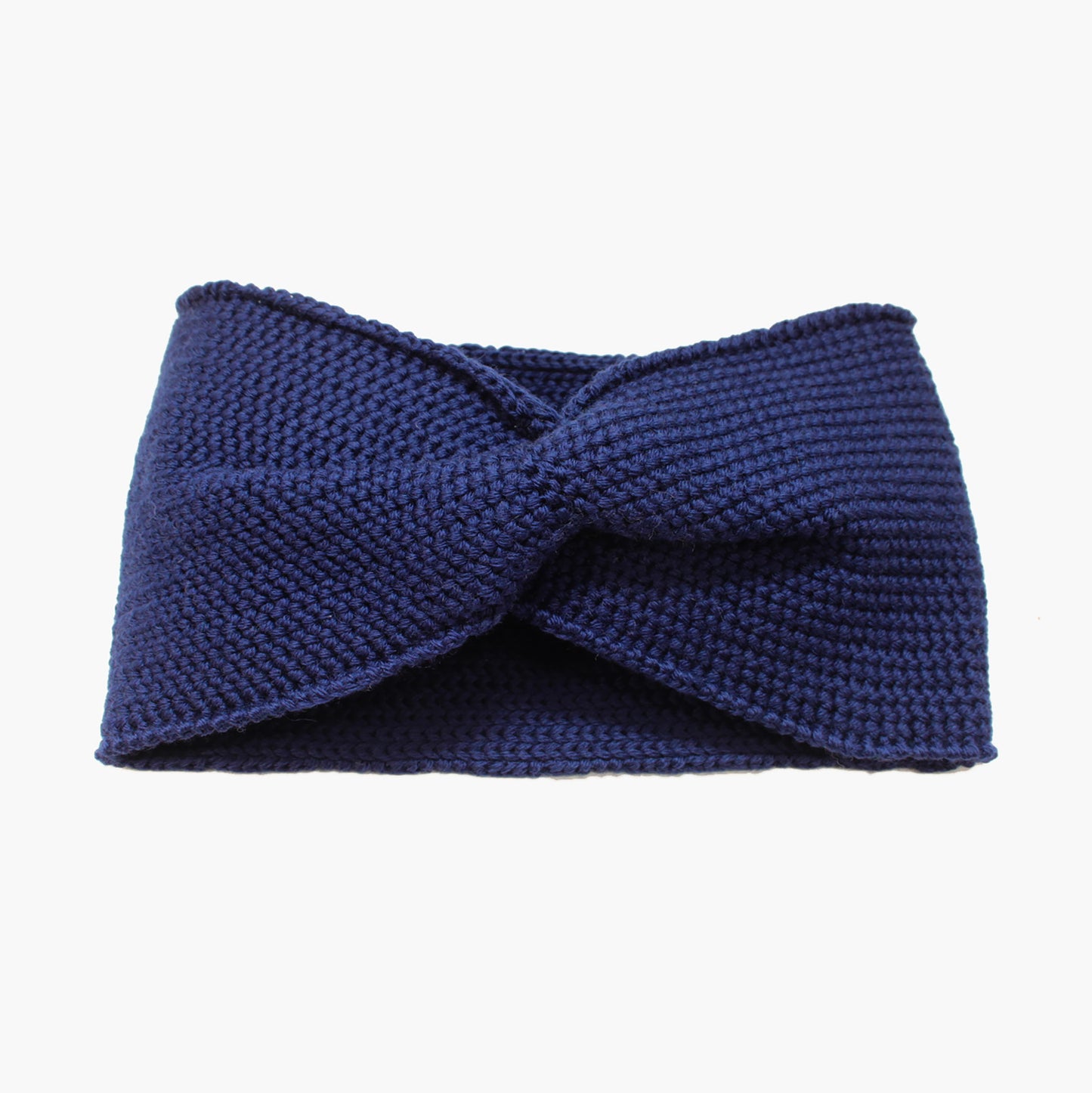 Royalblaues Stirnband mit einer Turban-ähnlichen Verdrehung. Gestrickt im Doubleface Patentmuster, außen Knötchenstruktur und Innen sieht es wie ein klassisch rechts gestricktes Muster aus.