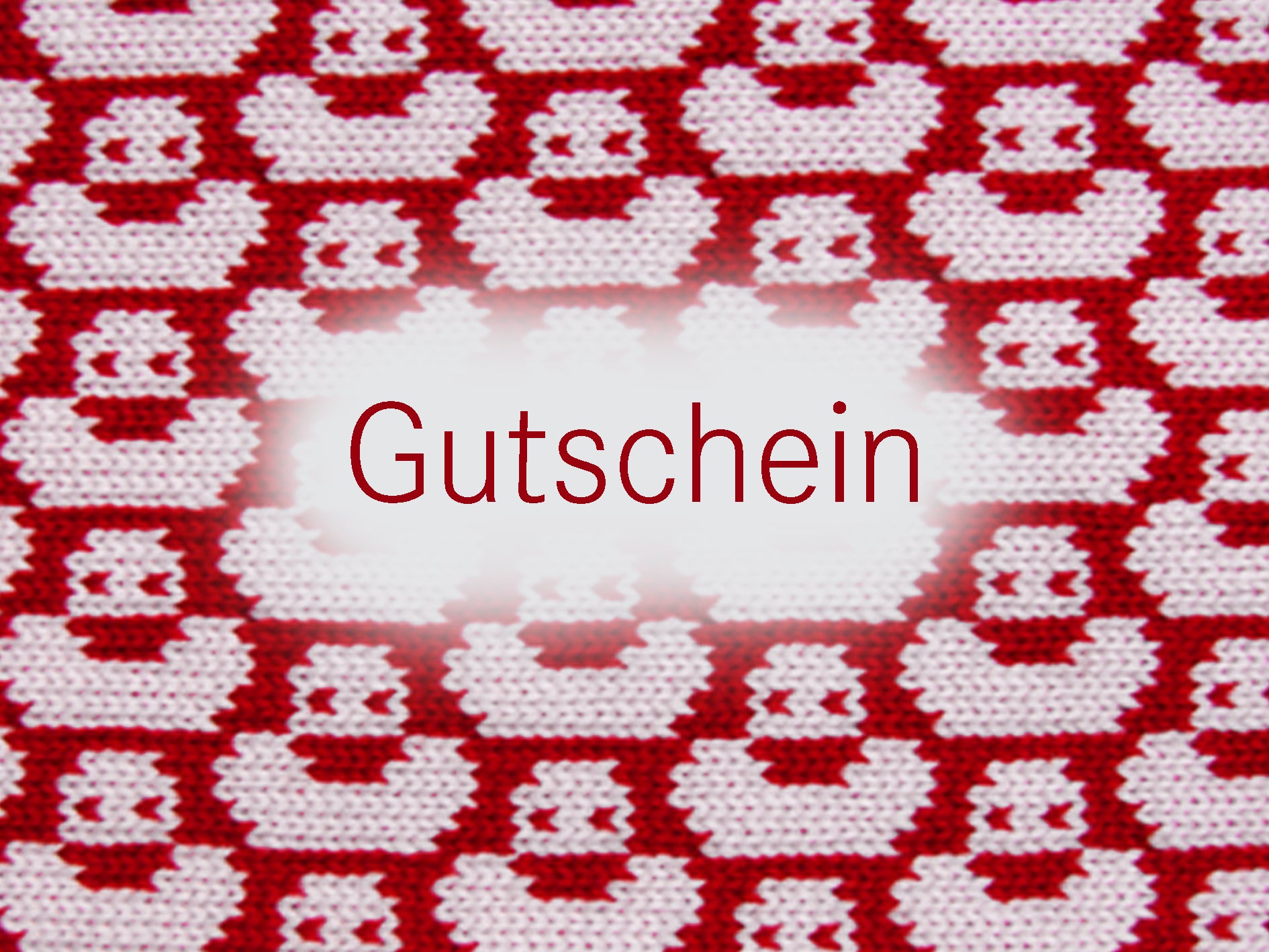 Geschenkkarte auf der Gutschein steht, auf der Karte wurde das strickmuster mit den Enten in Rot/Weiß gedruckt